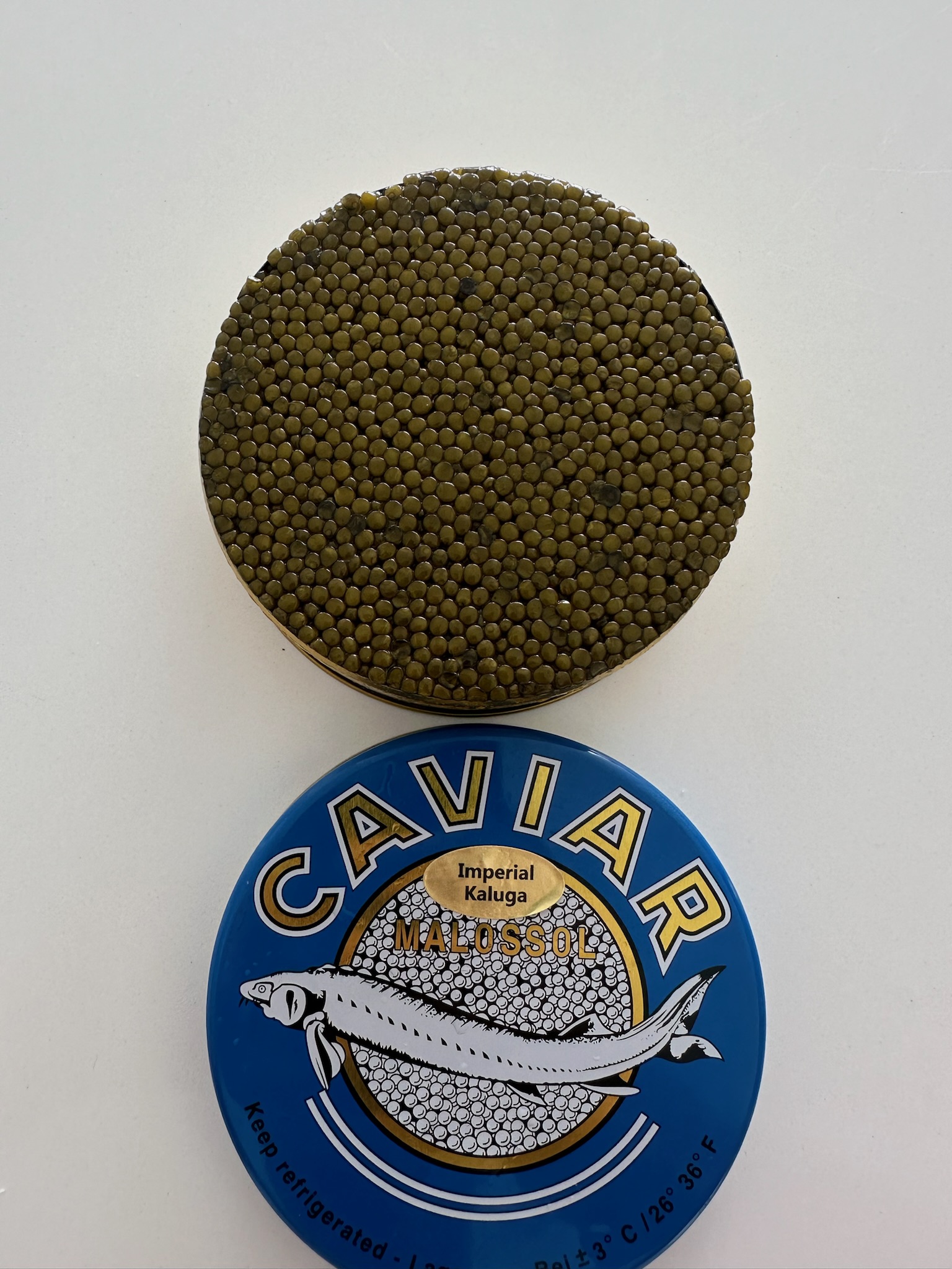 Close-up of Monsieur Caviar pearls on a mother-of-pearl spoon
