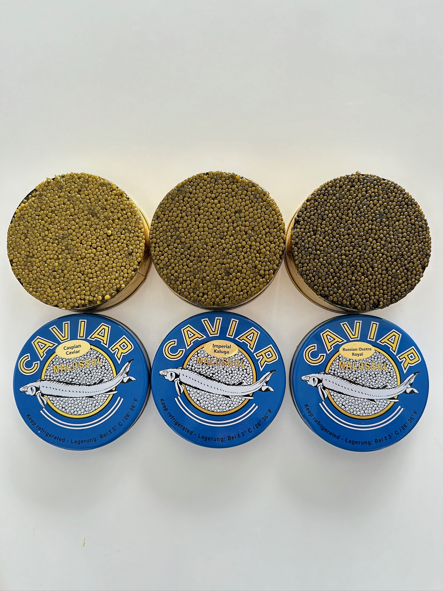 Collection of Monsieur Caviar tins — curated trio